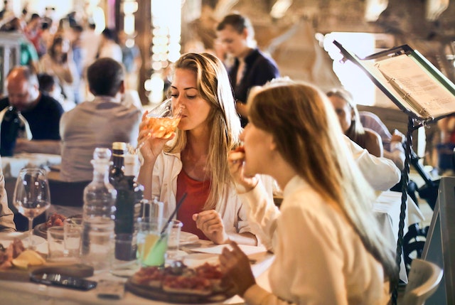 women at dinner table